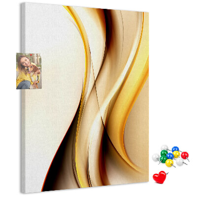 Memobord van kurk met elegante gouden golven op een lichte achtergrond