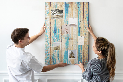 Kurken prikbord oud houten paneel met blauwe accenten