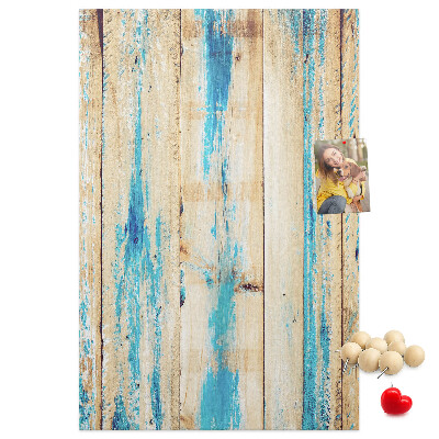 Kurken prikbord oud houten paneel met blauwe accenten