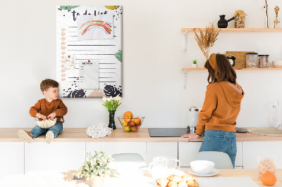 Kurken prikbord met een print van kleurrijke bladeren op een takenlijst
