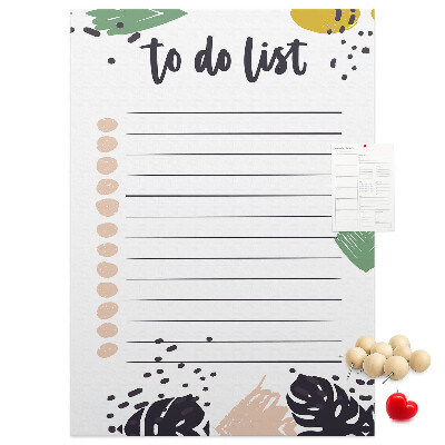 Kurken prikbord met een print van kleurrijke bladeren op een takenlijst