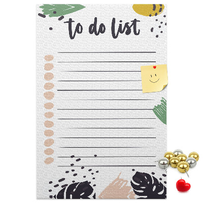 Kurken prikbord met een print van kleurrijke bladeren op een takenlijst
