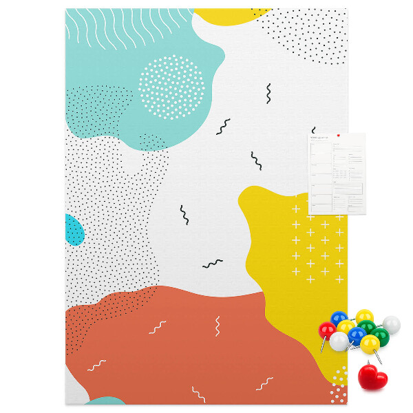 Kurken memobord met kleurrijke abstracte vormen en patronen