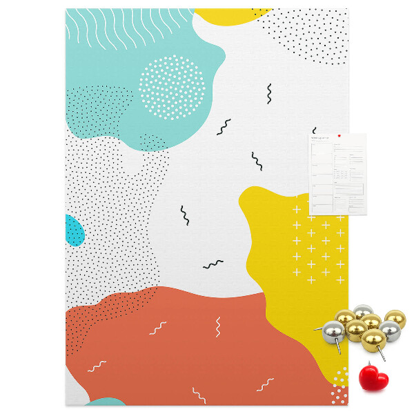 Kurken memobord met kleurrijke abstracte vormen en patronen
