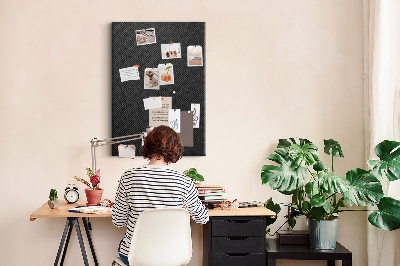 Prikbord van kurk met zwarte textuur en een subtiel houtskoolpatroon