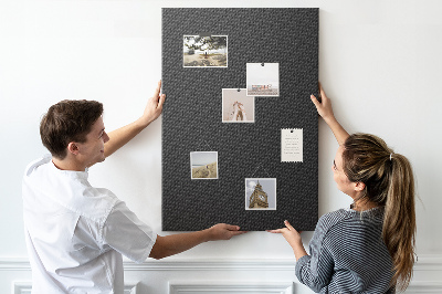 Prikbord van kurk met zwarte textuur en een subtiel houtskoolpatroon