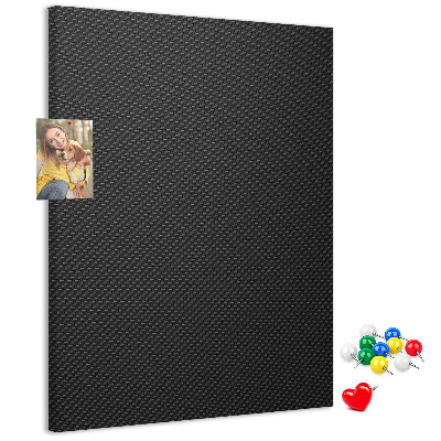 Prikbord van kurk met zwarte textuur en een subtiel houtskoolpatroon