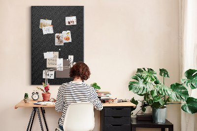 Prikbord van kurk met zwarte textuur en een subtiel houtskoolpatroon