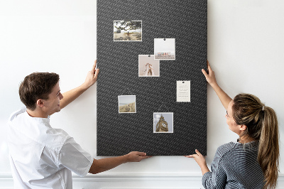 Prikbord van kurk met zwarte textuur en een subtiel houtskoolpatroon