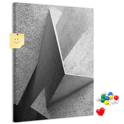 Prikbord van kurk met betongeometrie in grijstinten