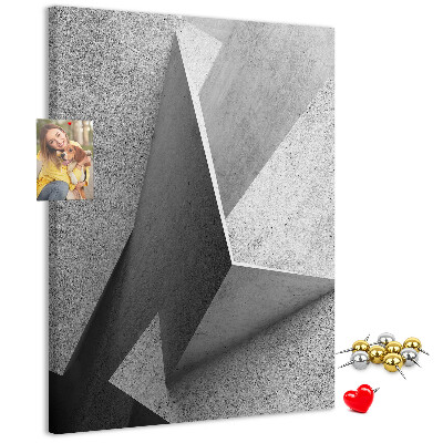 Prikbord van kurk met betongeometrie in grijstinten