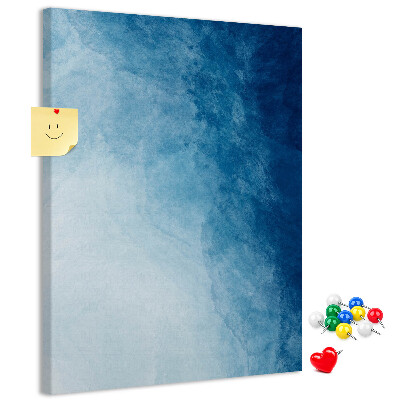 Kurken prikbord met een fijn geweven patroon in verschillende blauwtinten