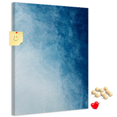 Kurken prikbord met een fijn geweven patroon in verschillende blauwtinten