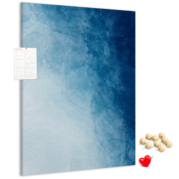 Kurken prikbord met een fijn geweven patroon in verschillende blauwtinten