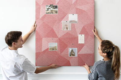 Kurken memobord met abstract roze geometrisch driehoekspatroon
