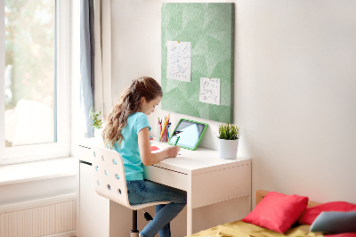 Prikbord van kurk met geometrische vormen in groene tinten
