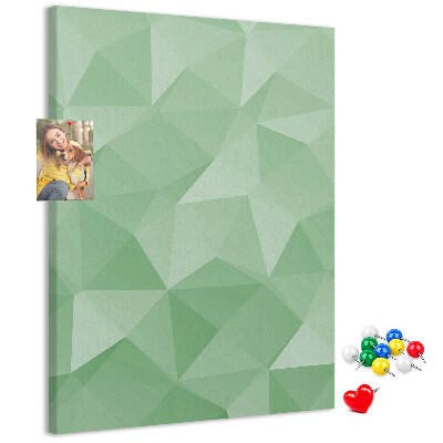 Prikbord van kurk met geometrische vormen in groene tinten