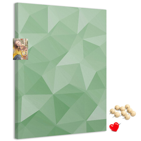 Prikbord van kurk met geometrische vormen in groene tinten
