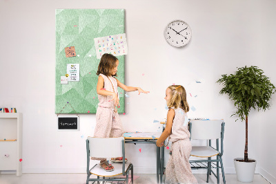 Prikbord van kurk met geometrische vormen in groene tinten