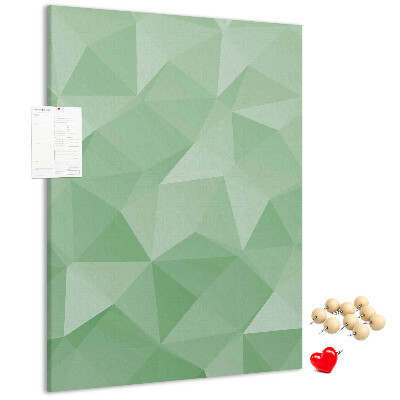 Prikbord van kurk met geometrische vormen in groene tinten