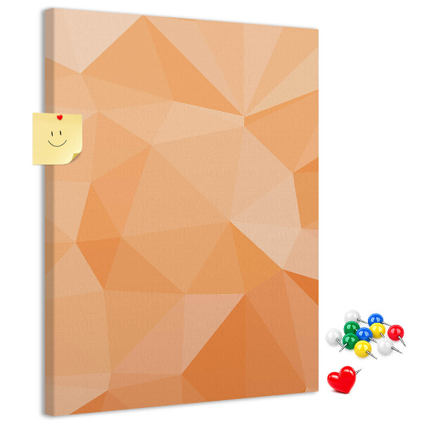 Kurk prikbord met geometrische vormen in oranje en beige tinten