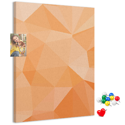 Kurk prikbord met geometrische vormen in oranje en beige tinten