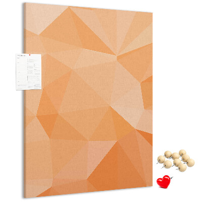 Kurk prikbord met geometrische vormen in oranje en beige tinten