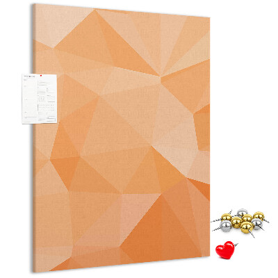 Kurk prikbord met geometrische vormen in oranje en beige tinten