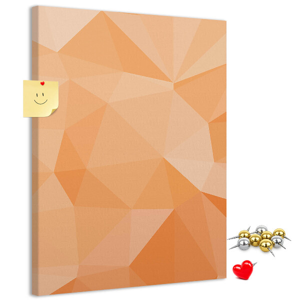 Kurk prikbord met geometrische vormen in oranje en beige tinten