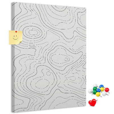 Memobord van kurk met abstracte lijnen en golven op de achtergrond