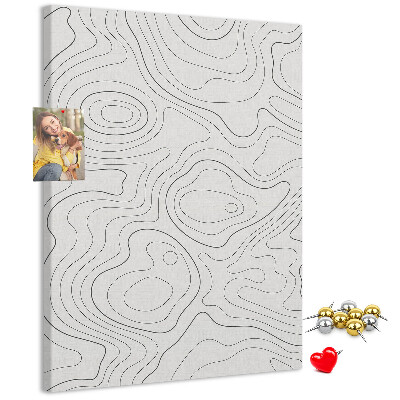 Memobord van kurk met abstracte lijnen en golven op de achtergrond