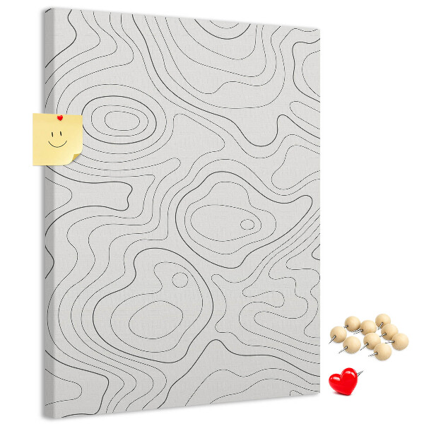 Memobord van kurk met abstracte lijnen en golven op de achtergrond