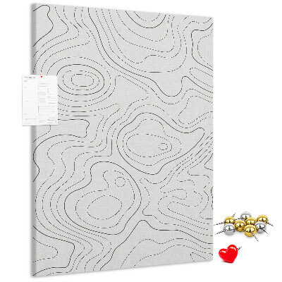 Memobord van kurk met abstracte lijnen en golven op de achtergrond