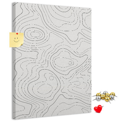 Memobord van kurk met abstracte lijnen en golven op de achtergrond