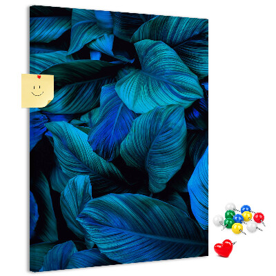 Memobord van kurk met nachtbladeren in verschillende tinten blauw