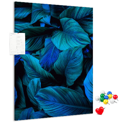 Memobord van kurk met nachtbladeren in verschillende tinten blauw