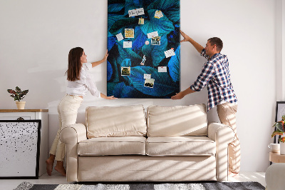 Memobord van kurk met nachtbladeren in verschillende tinten blauw