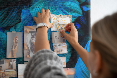 Memobord van kurk met nachtbladeren in verschillende tinten blauw