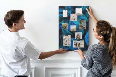 Memobord van kurk met nachtbladeren in verschillende tinten blauw