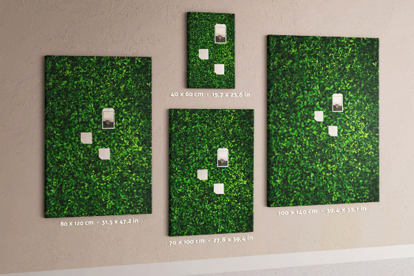 Kurk memobord met decoratieve groene bladeren