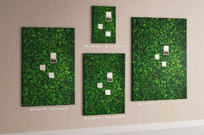 Kurk memobord met decoratieve groene bladeren