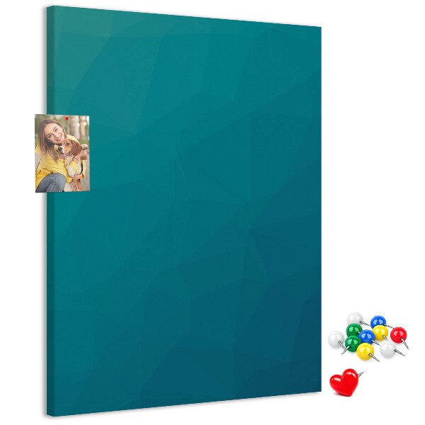 Kurken prikbord met geometrische blauwtinten op de achtergrond