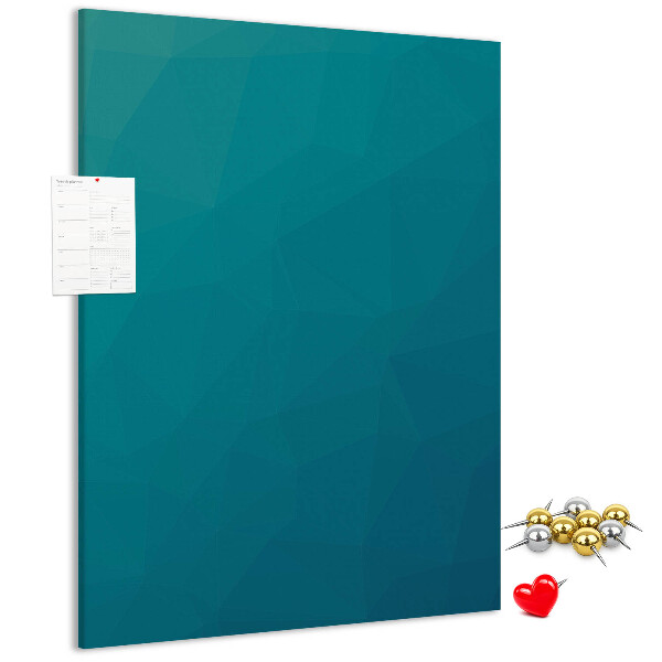 Kurken prikbord met geometrische blauwtinten op de achtergrond