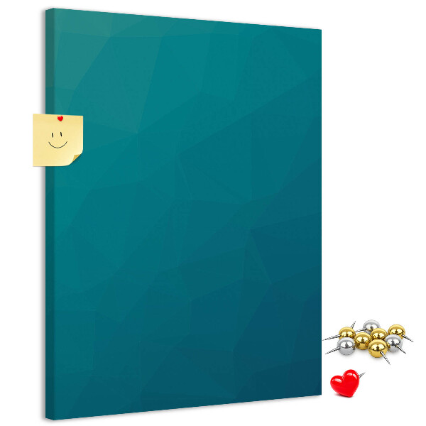 Kurken prikbord met geometrische blauwtinten op de achtergrond