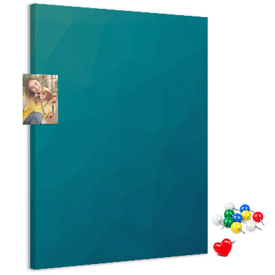 Kurken prikbord met geometrische blauwtinten op de achtergrond