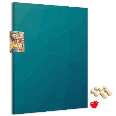Kurken prikbord met geometrische blauwtinten op de achtergrond