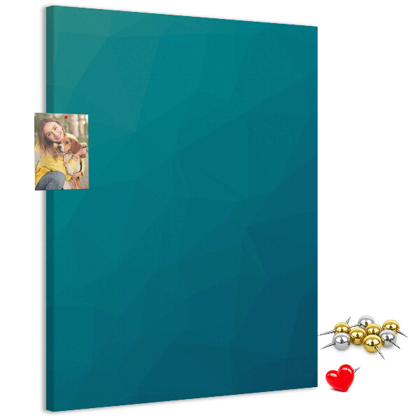 Kurken prikbord met geometrische blauwtinten op de achtergrond