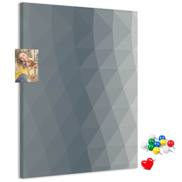 Kurken memobord met geometrisch patroon in grijstinten
