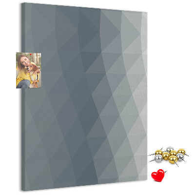 Kurken memobord met geometrisch patroon in grijstinten