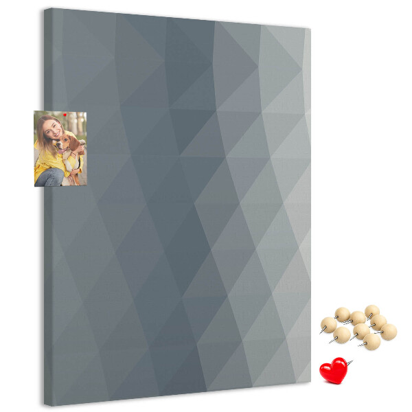 Kurken memobord met geometrisch patroon in grijstinten
